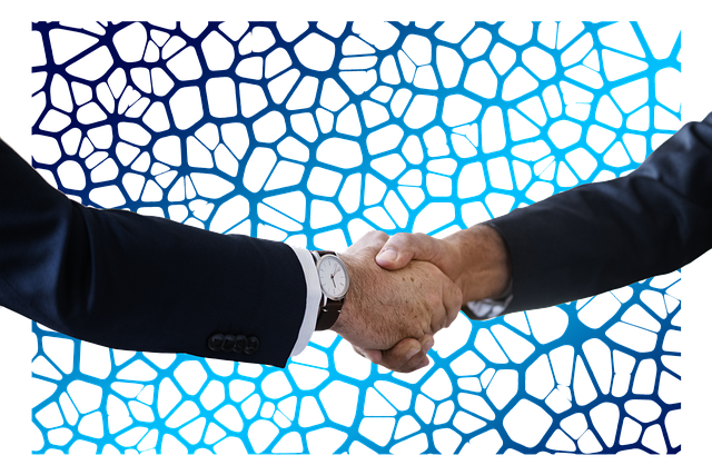 Teacher holding curriculum guide with Great Lakes watershed map